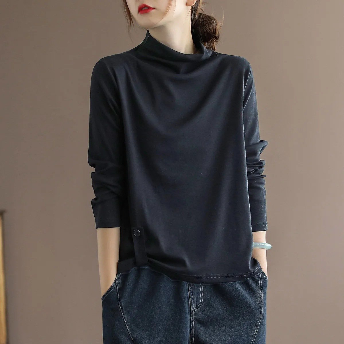 เสื้อกันลมผู้หญิงรุ่นยาวปานกลาง